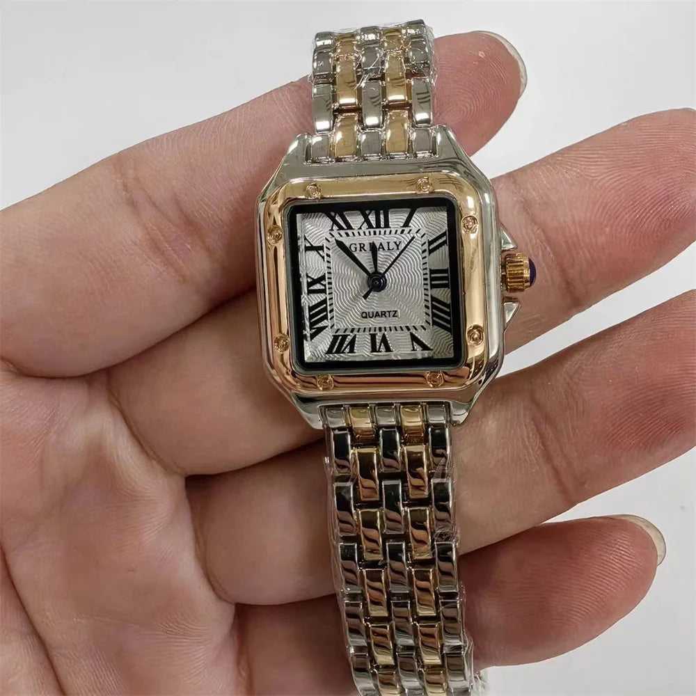 Montre femme dorée acier